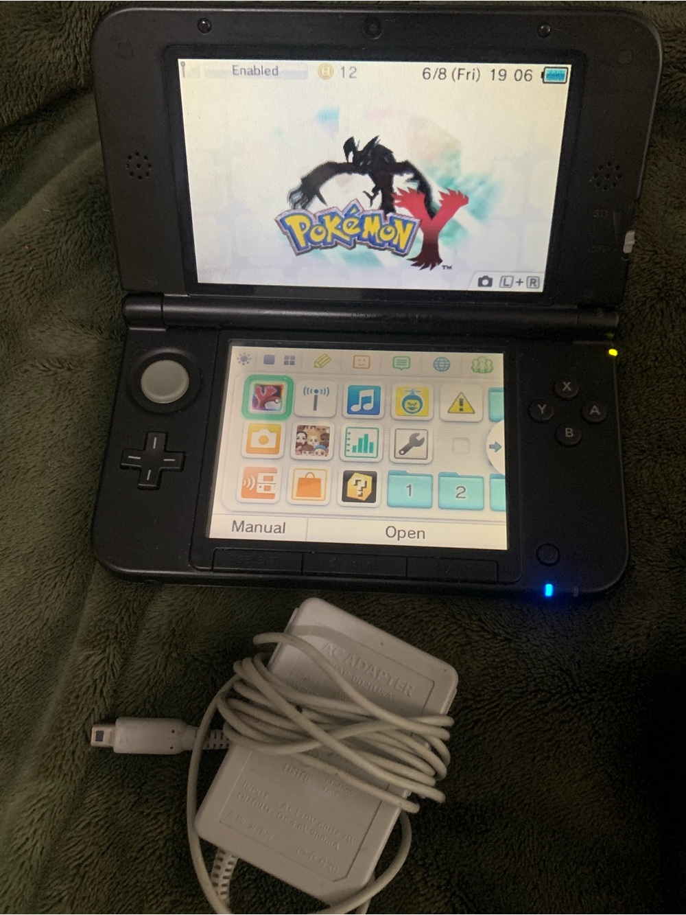 Nintendo 3DS XL Handheld Console - Black with White Charger
